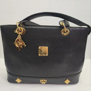 Vintage black leather MCM tote bag with COA
